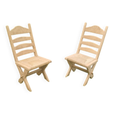 Pairs of vintage Scandinavian chairs with splayed legs.
