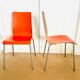 2 bicoloured wooden and steel chairs in orange and red from Habitat, around 1990.