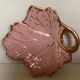 Tray, ring holder in the shape of a pink and gold leaf.