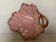 Tray, ring holder in the shape of a pink and gold leaf.