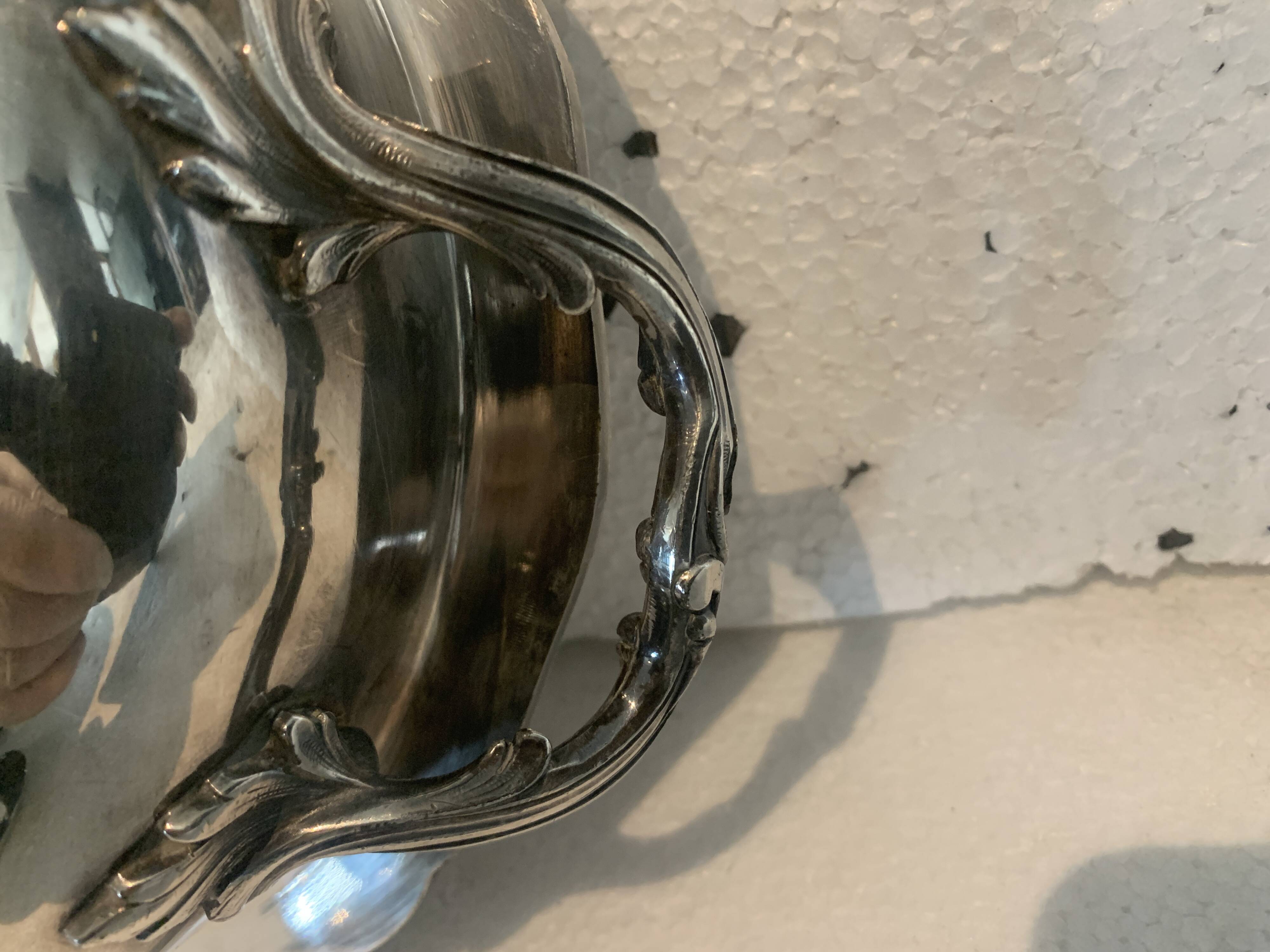 Covered broth and two small silver-plated dishes, 20th century