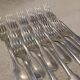 11 silver-plated table forks by Christofle Cluny with stripes
