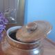 Old salt pot in sandstone, with lid