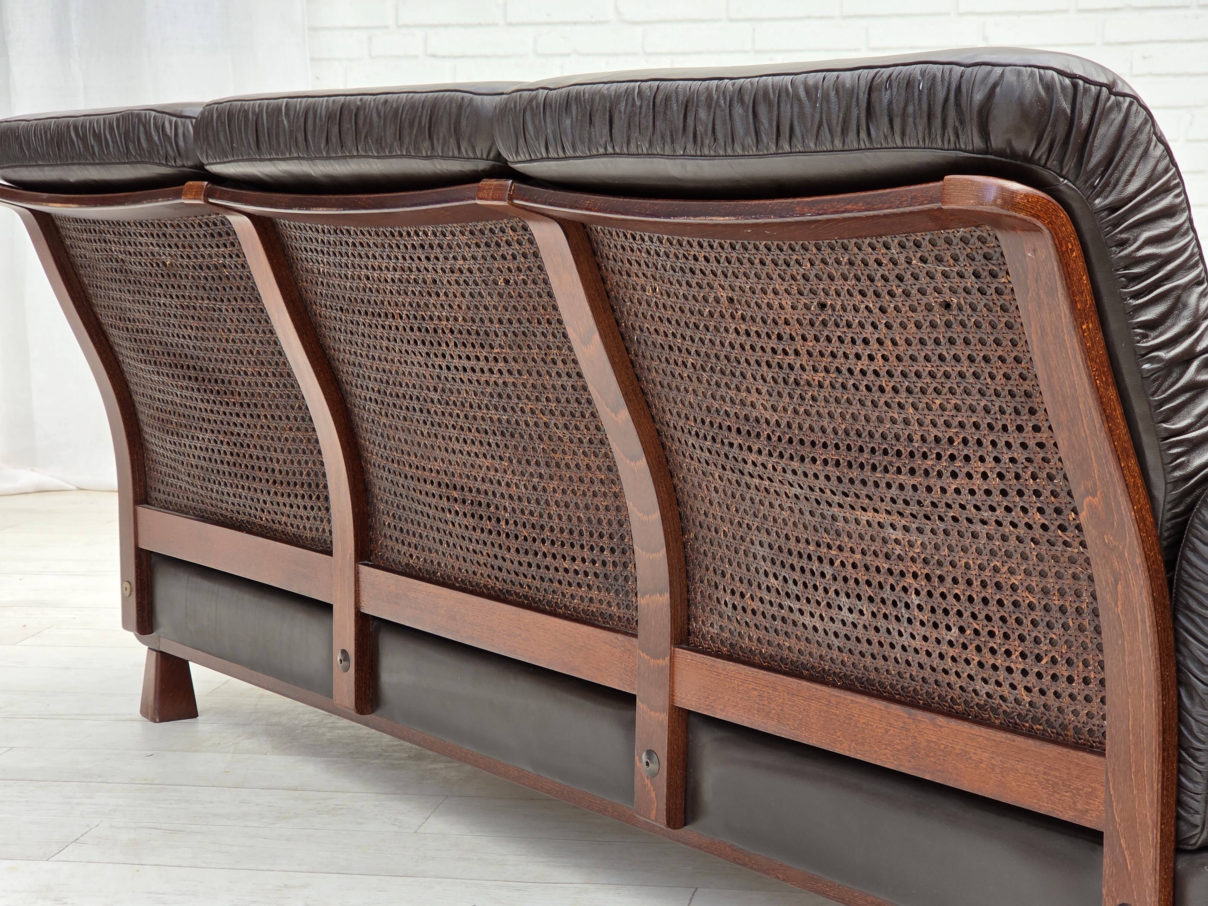 1970s, Scandinavian 3-seater sofa, furniture leather, teak wood legs.