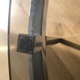Round coffee table in chrome metal and smoked glass