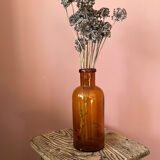 Amber glass bottle vase