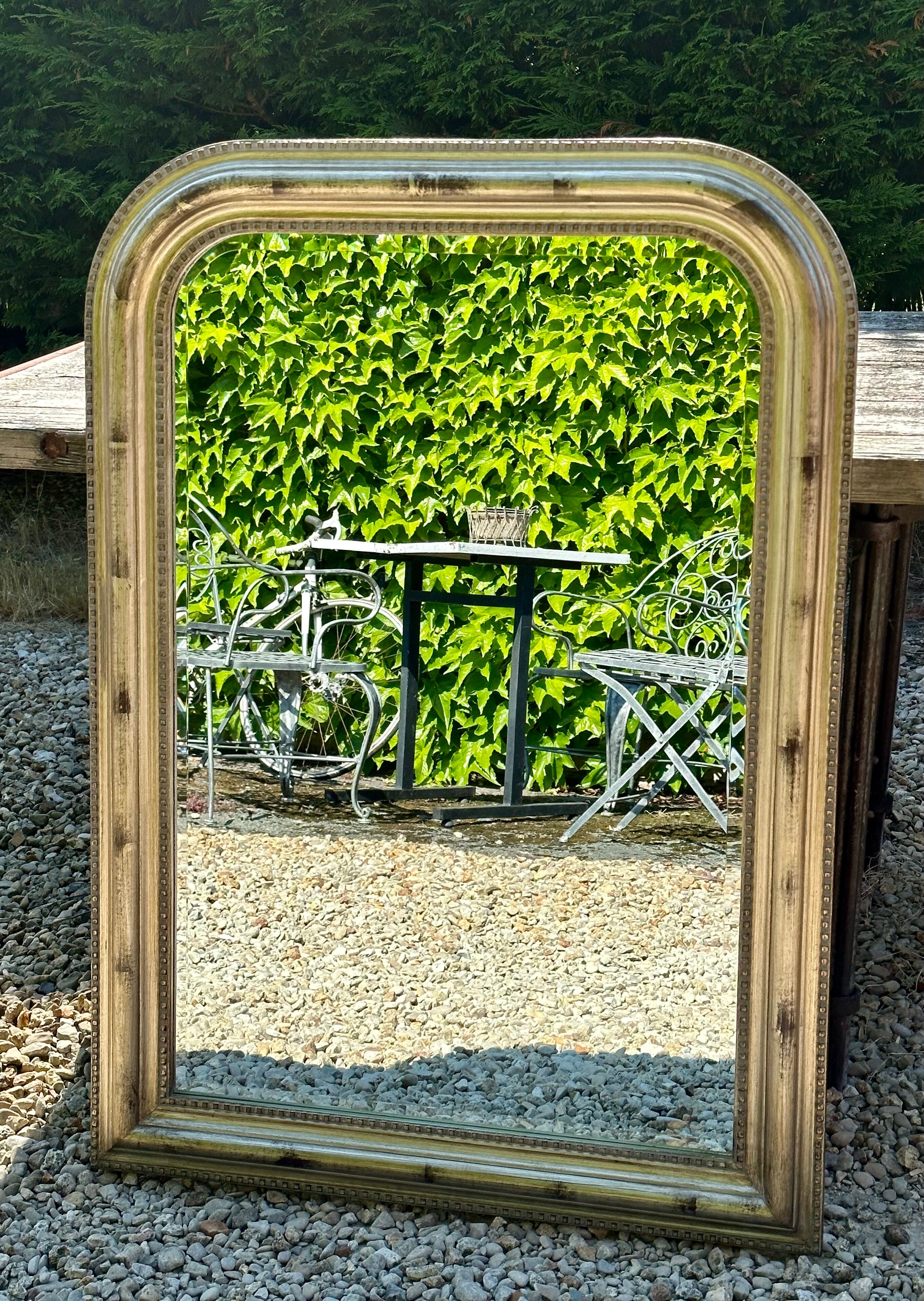 Louis Philippe style mirror in wood and gilded stuck 105,5x75cm