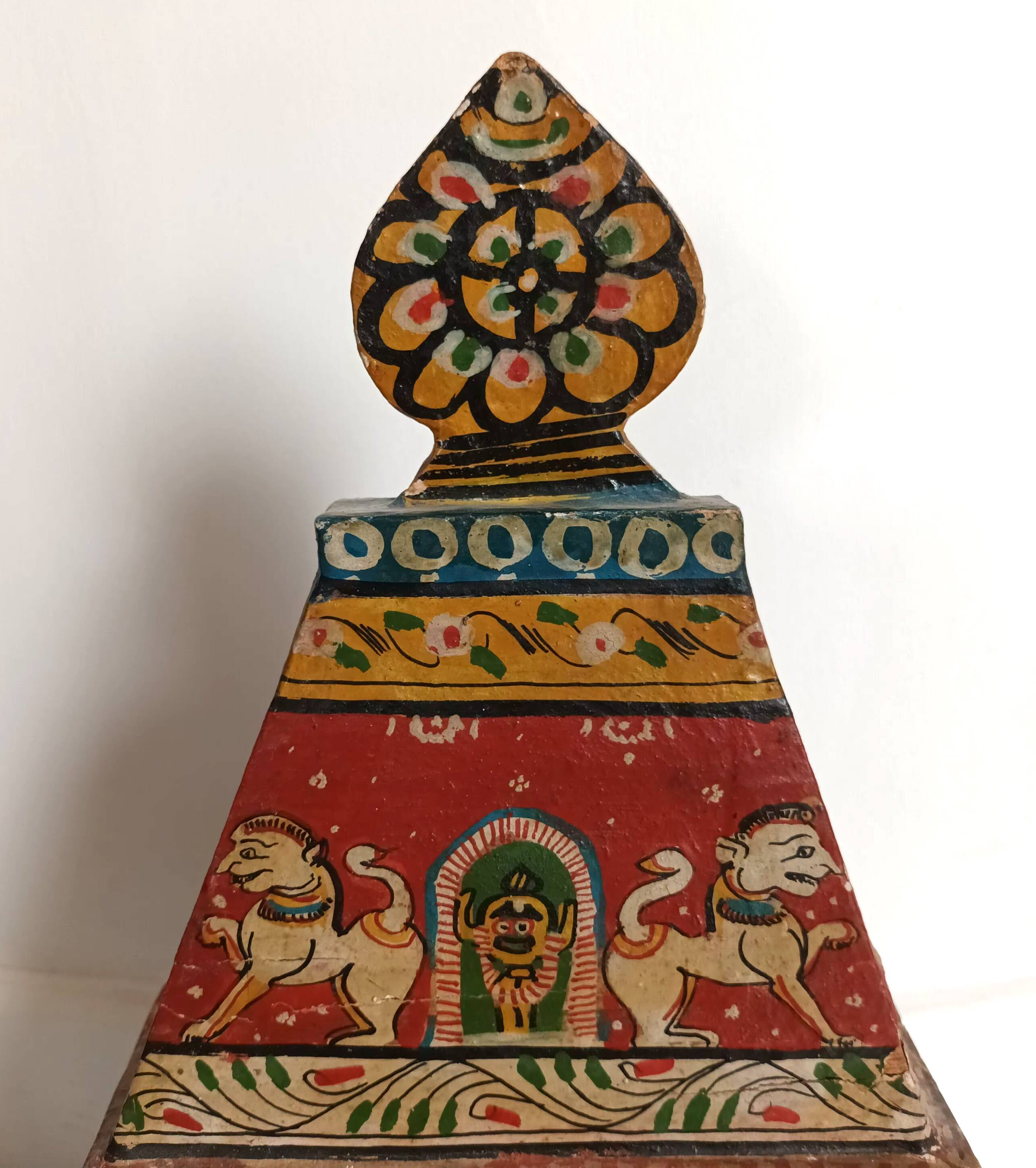 Indian temple made of hand-painted wood