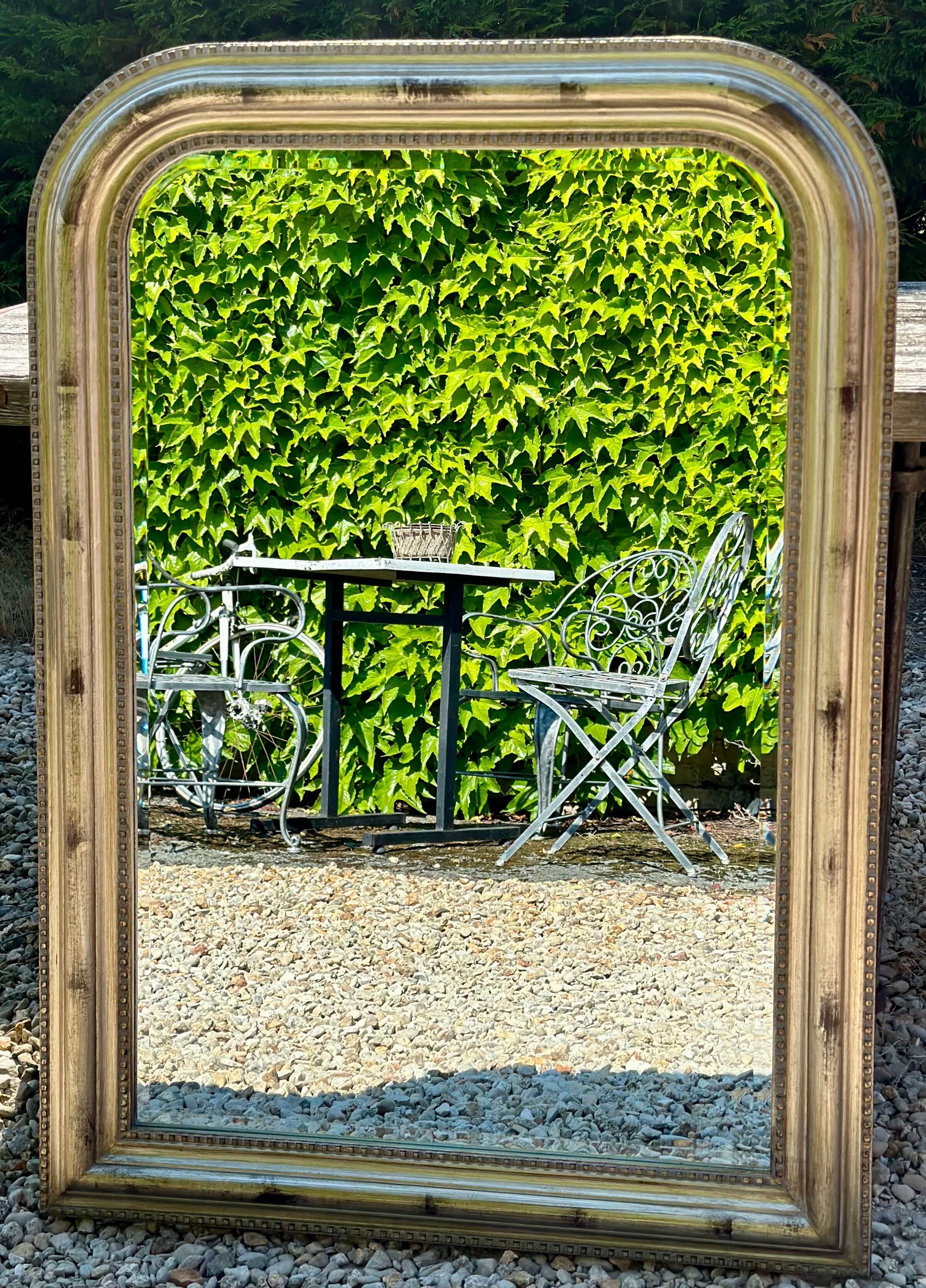 Louis Philippe style mirror in wood and gilded stuck 105,5x75cm
