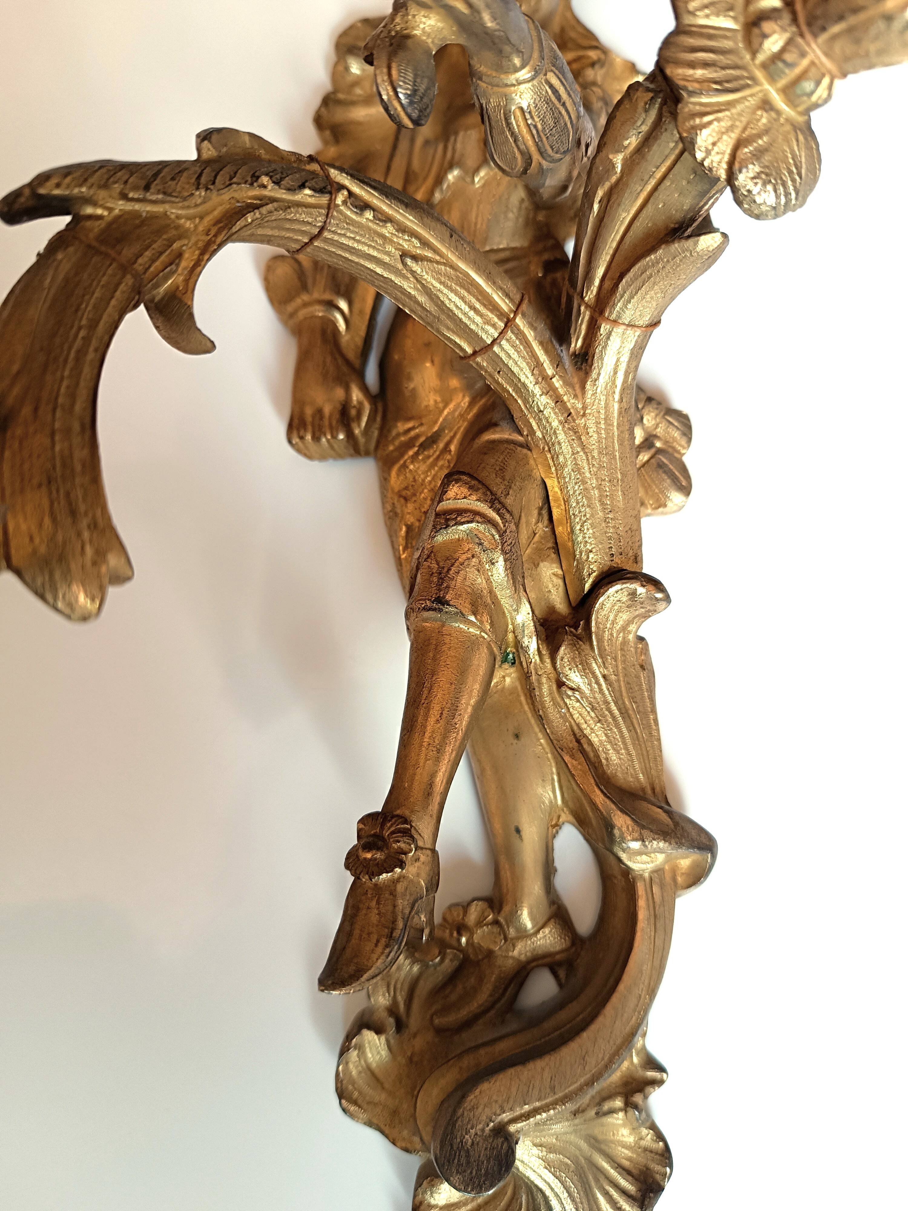 Pair of Regency style gilt bronze wall lights