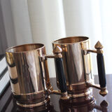 Pair of art deco bronze beer mugs France, 1940s, signed Bronze Star