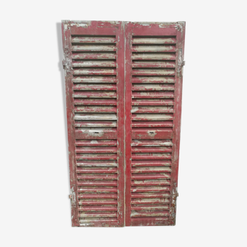 Pair of old wooden louvered shutters