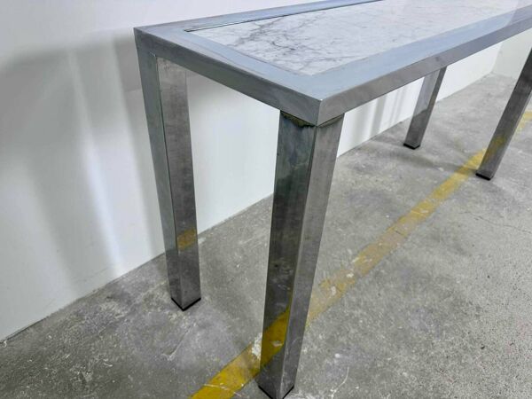 Console senventies structure chrome plateau marbre blanc