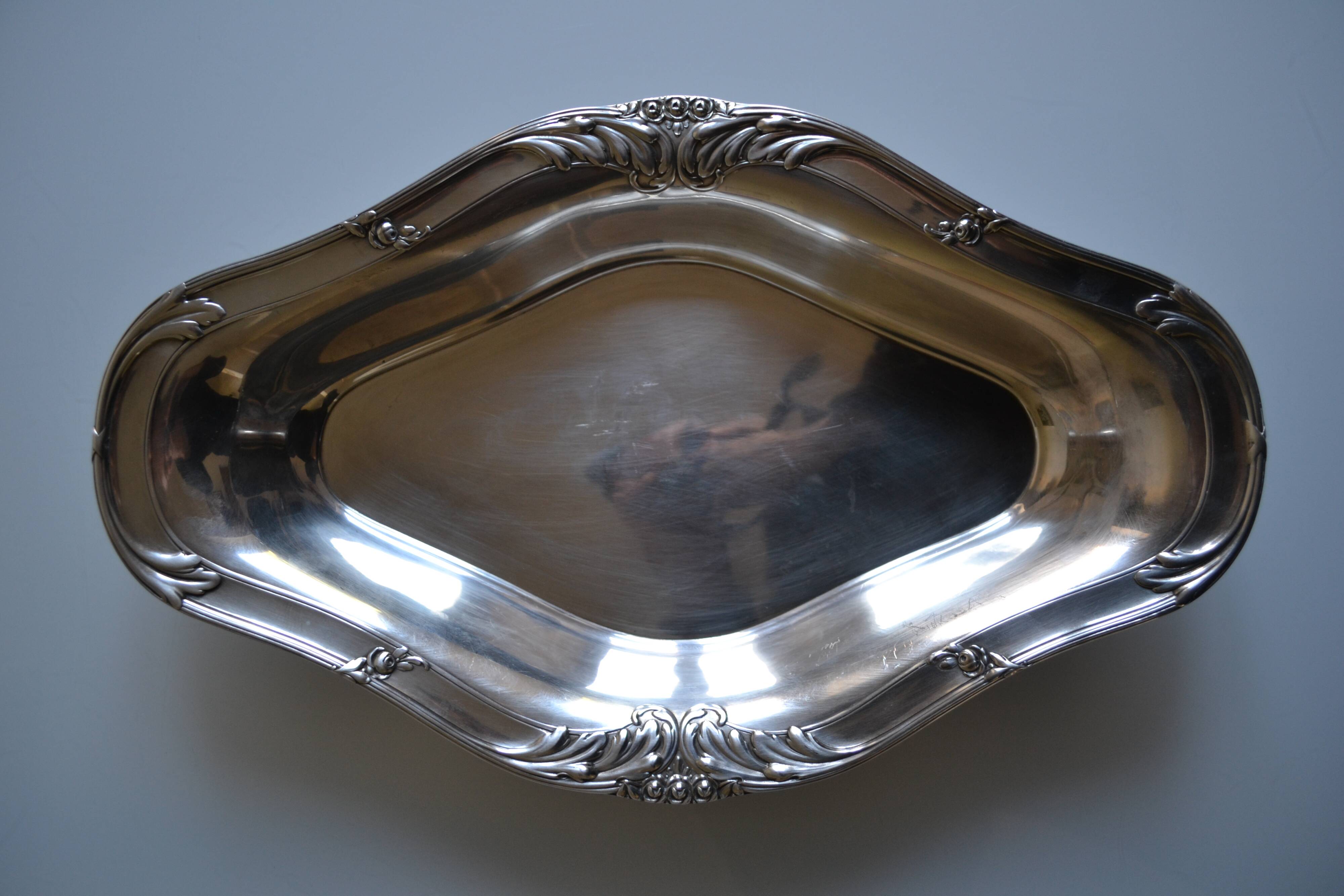 Flat basket cup in silver metal