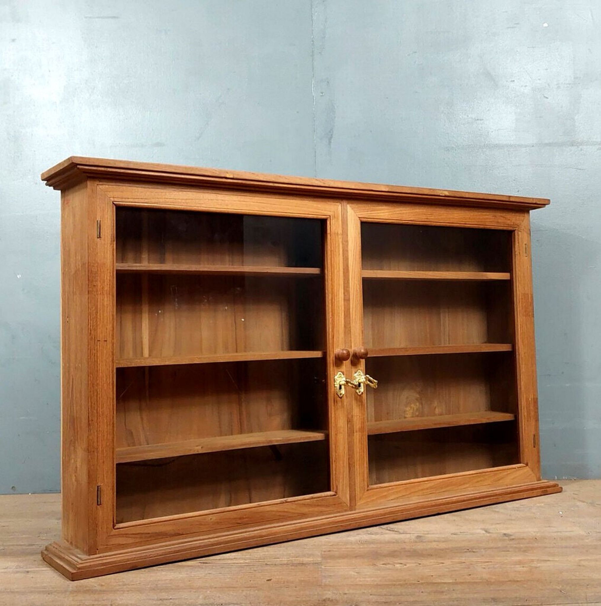 Narrow showcase in chestnut and exotic wood of the twentieth circa 1900