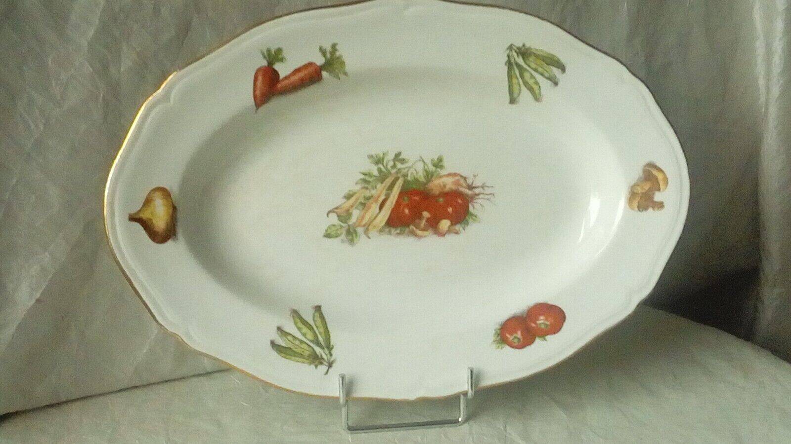 Hollow and oval earthenware dish with 4 seasons vegetable decoration