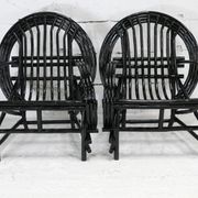Pair of black lacquered rattan armchairs. France, cira 1960.