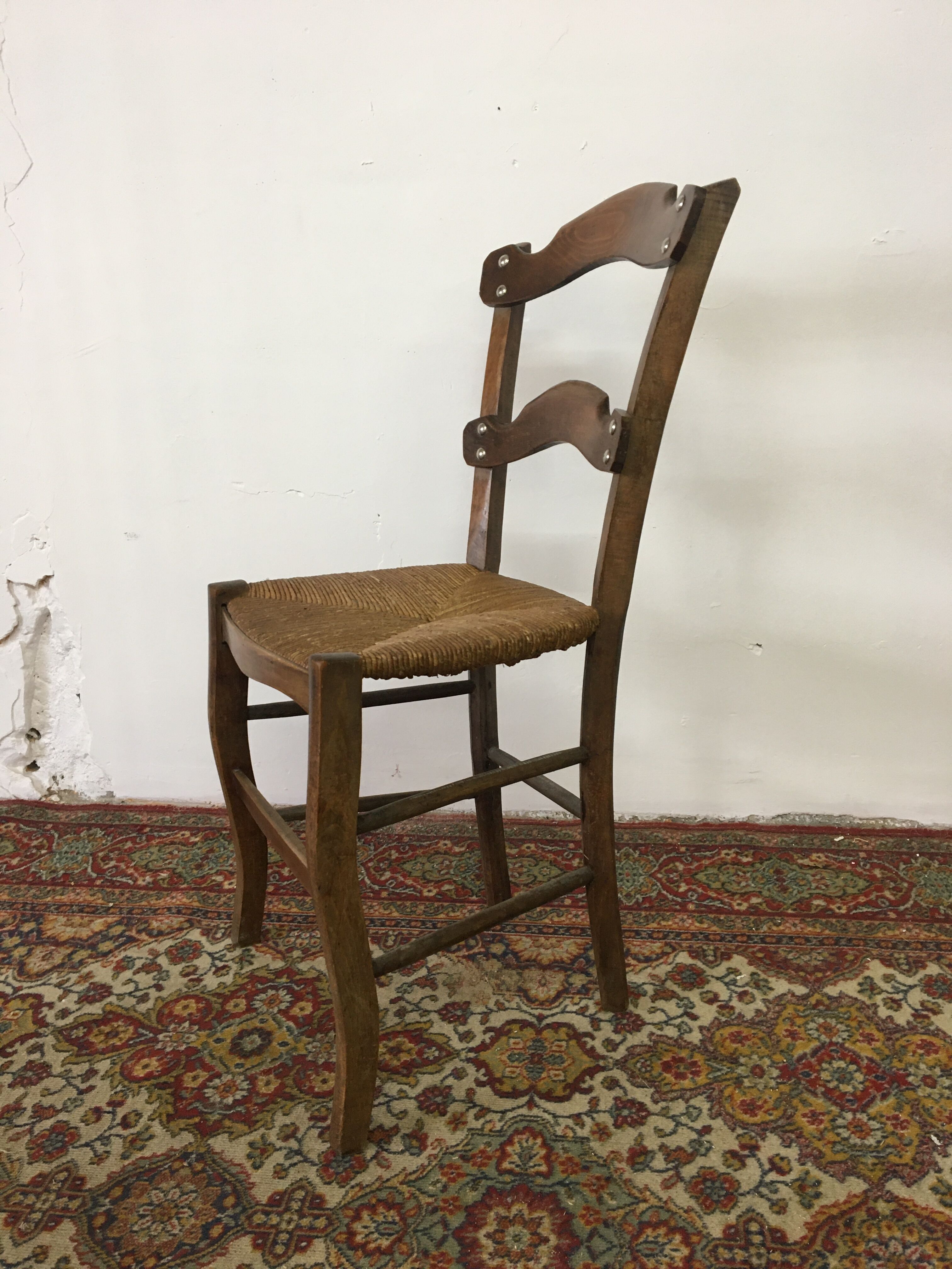 Old wood and straw chair