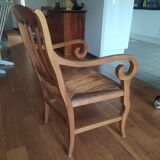 antique cherry and straw armchair with cathedral back