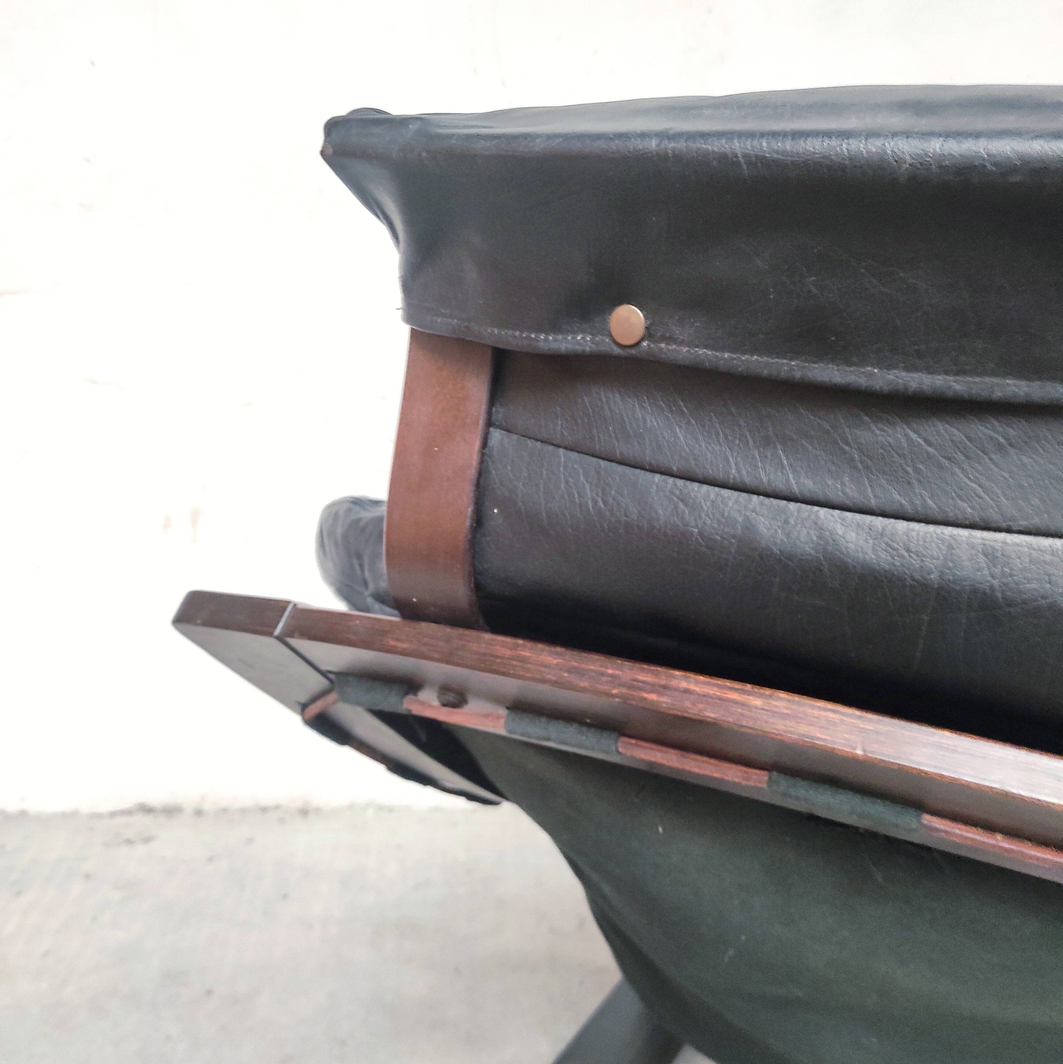 Pair of Kroken armchairs in black leather