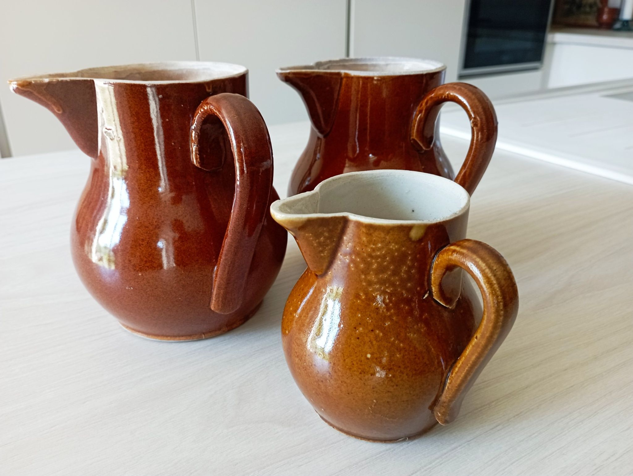 Set of 3 antique pitchers