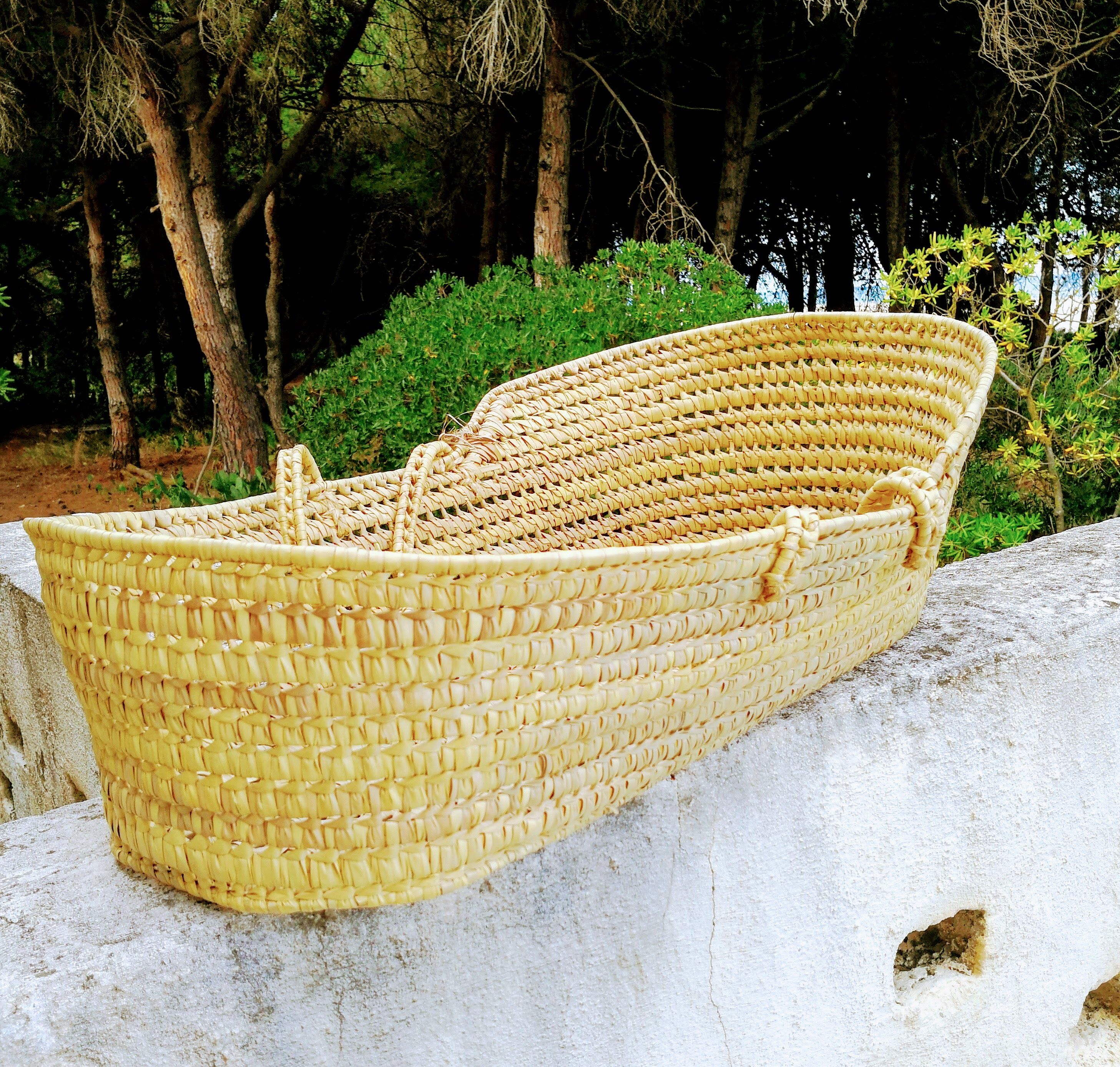 Vintage dressed wicker bassinet