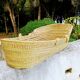 Vintage dressed wicker bassinet