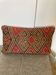 Coussin motif ethnique rouge doré