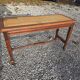 Beechwood piano bench with caning on the seat