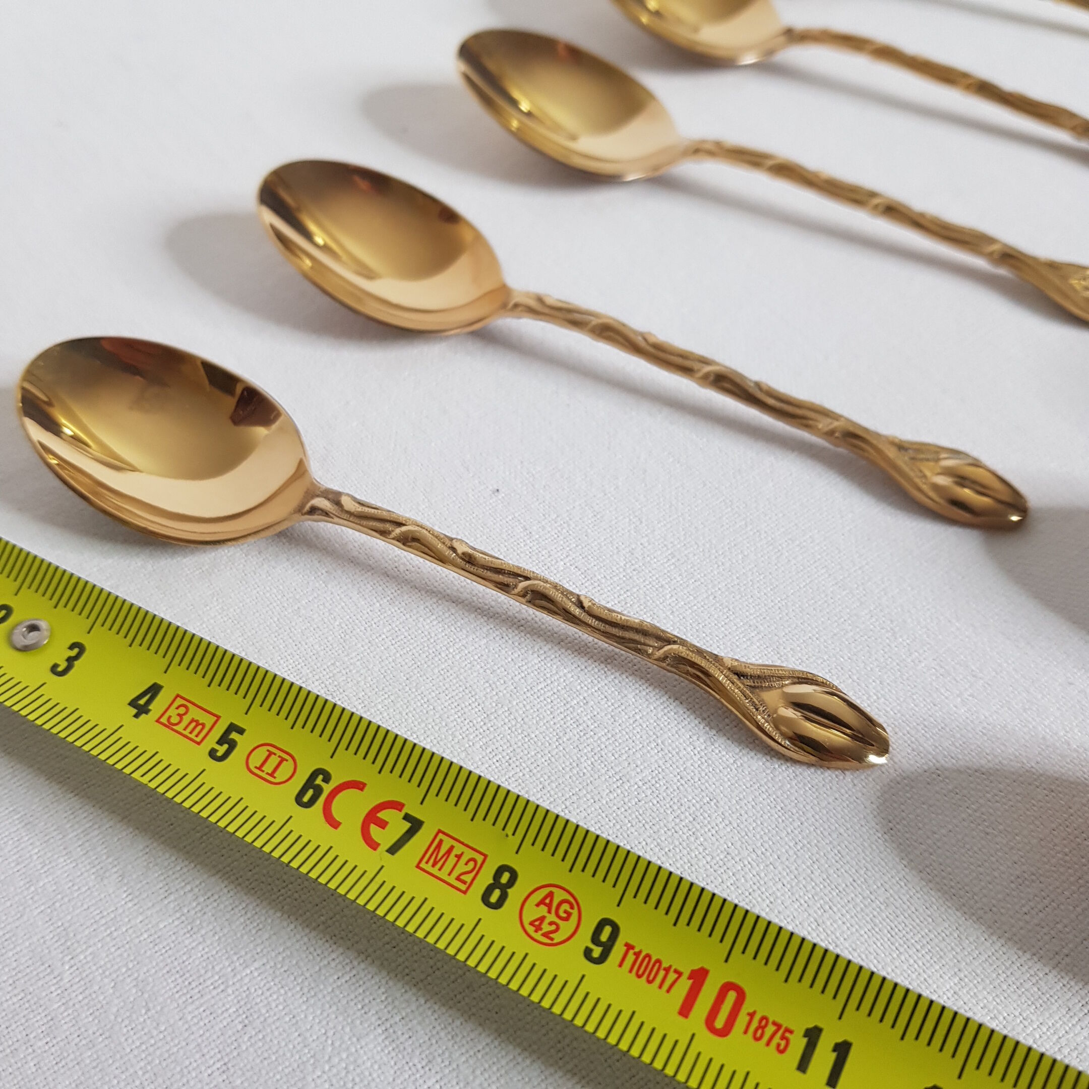 Set of 12 mocha spoons in golden metal with vegetable décor and coffee bean