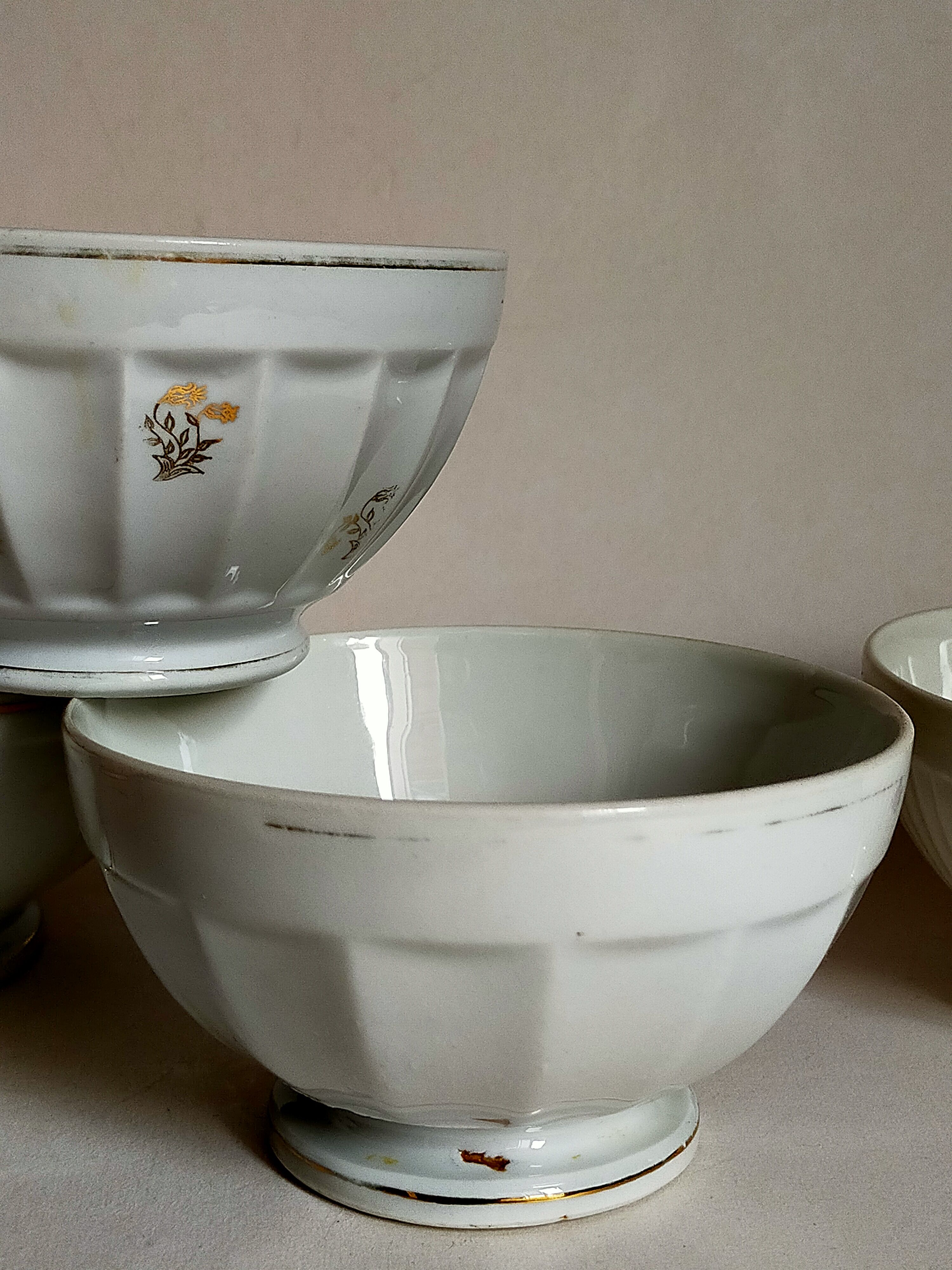 Five matching antique porcelain and earthenware bowls