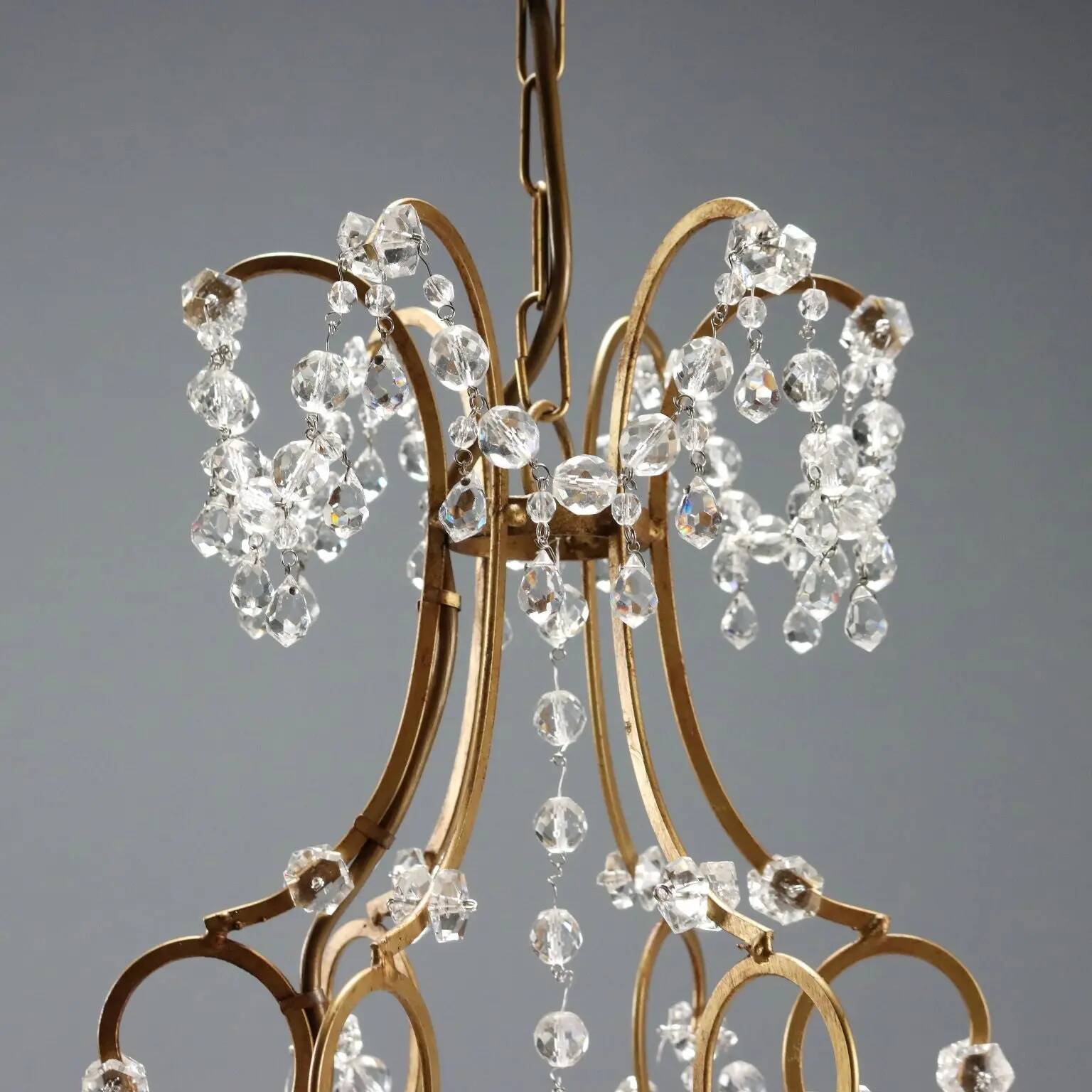 Antique chandelier in gilded iron and metal, Italy, 20th century