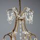 Antique chandelier in gilded iron and metal, Italy, 20th century