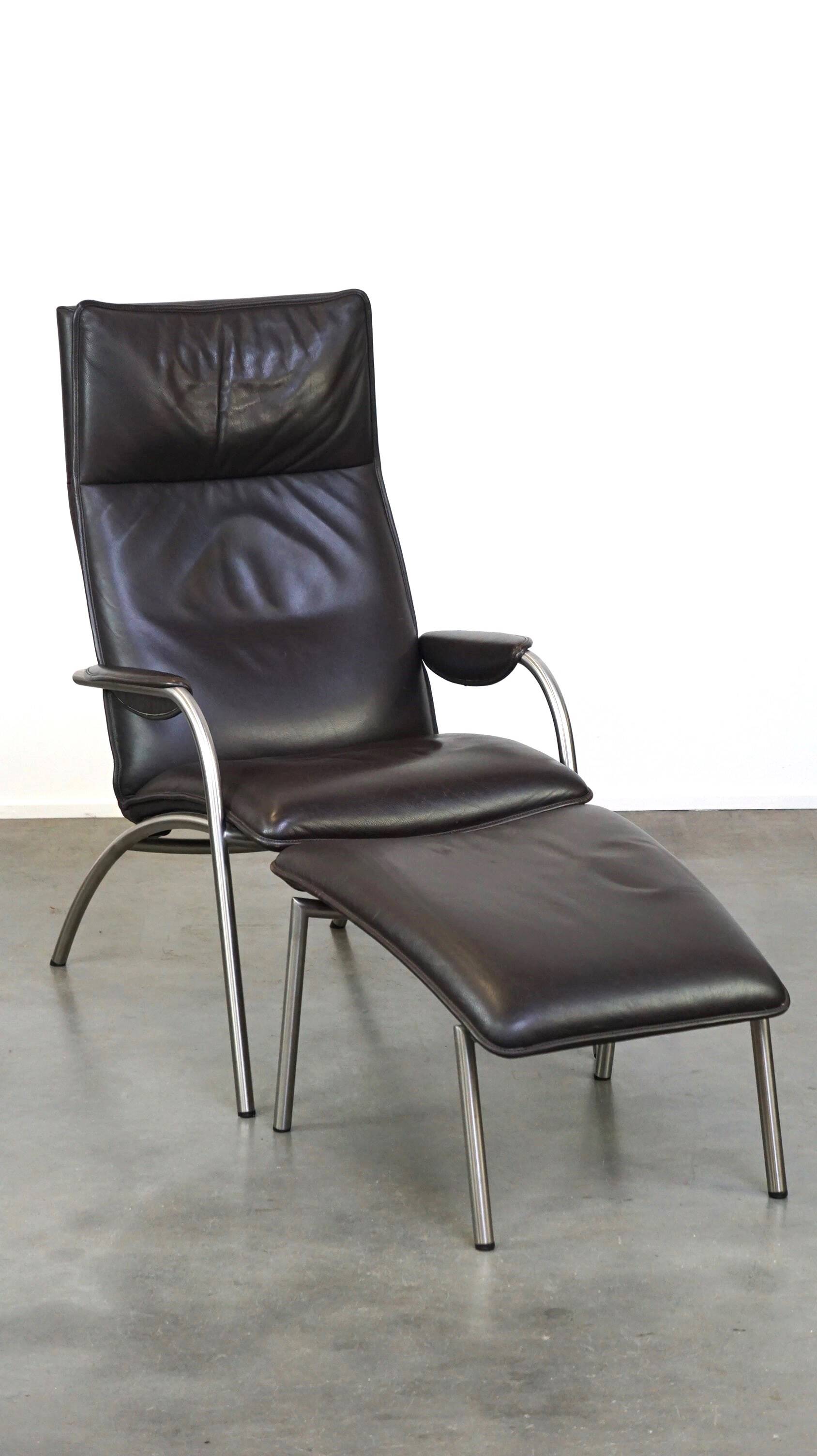 Dark brown leather design armchair + footstool De Sede DS 270