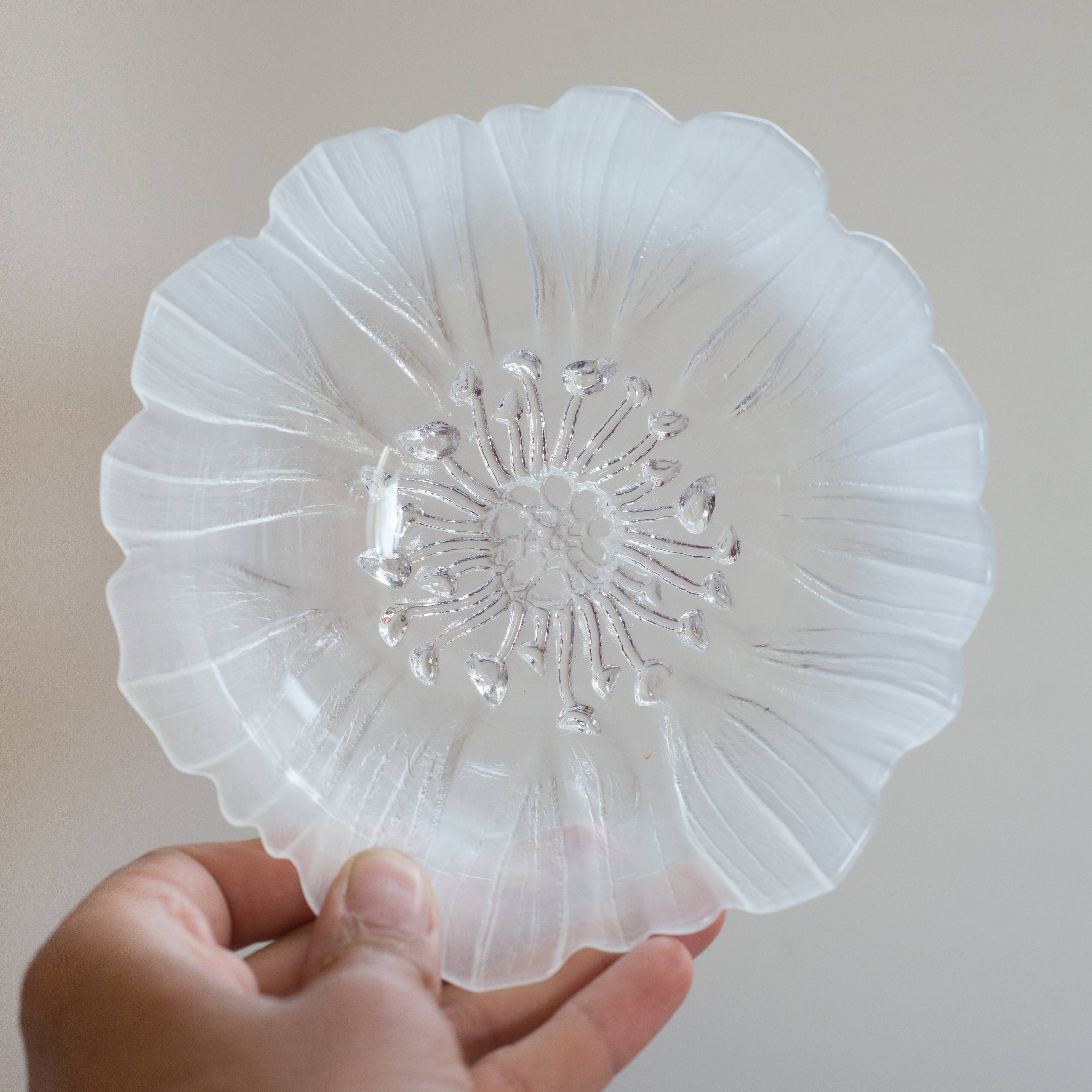 Cup or empty glass flower pocket