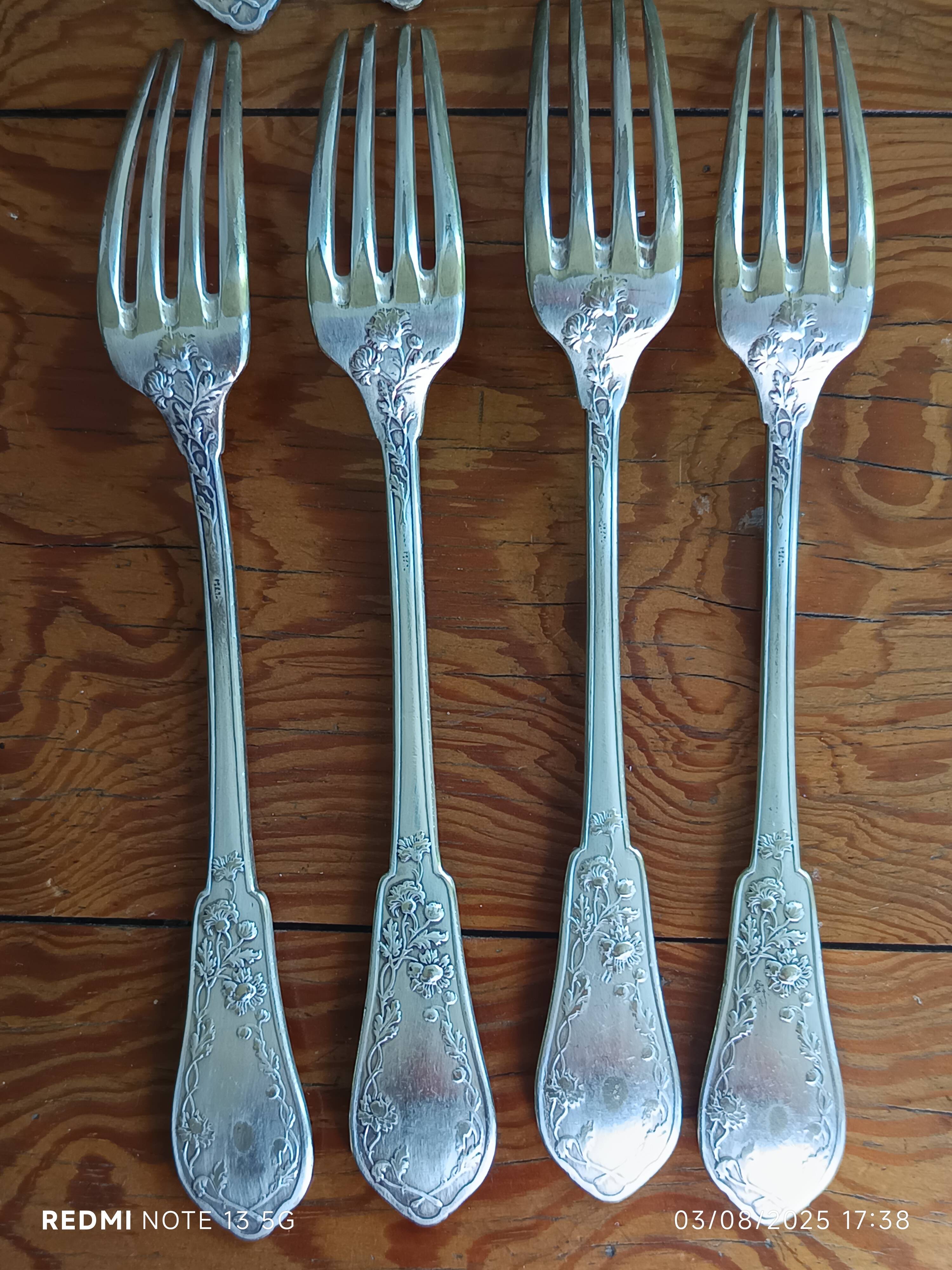9 silver-plated Art Nouveau forks 1900-1920 with daisy decoration