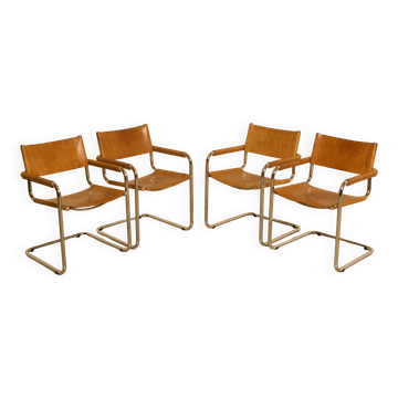 Set of 4 Italian cognac leather "Cantilever" chairs by Marcel Breuer.