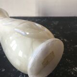 Vase in unbleached white marble with engraved flowers