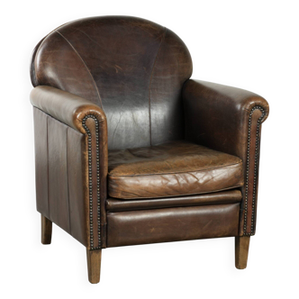 Characterful sheepskin design armchair with beautiful patina