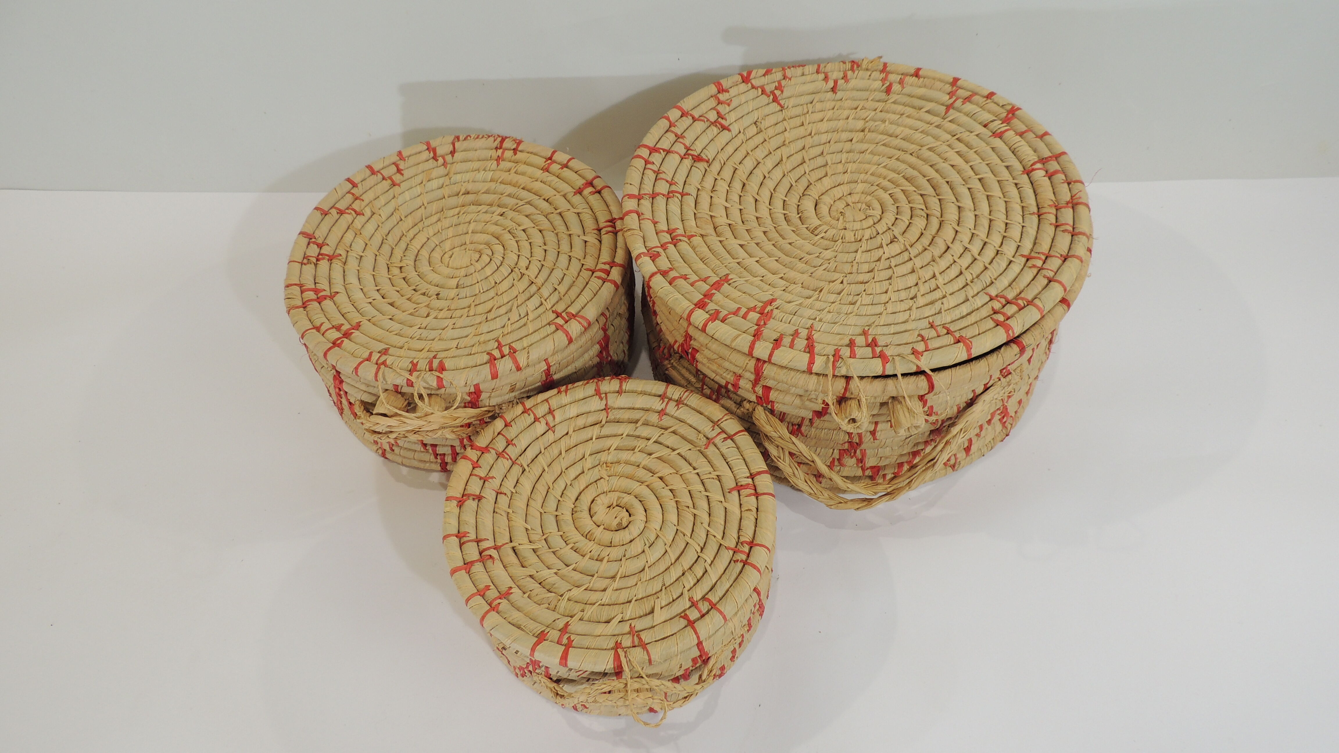 Set of three african raffia basket