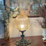 Bronze lamp and amber globe circa 1900