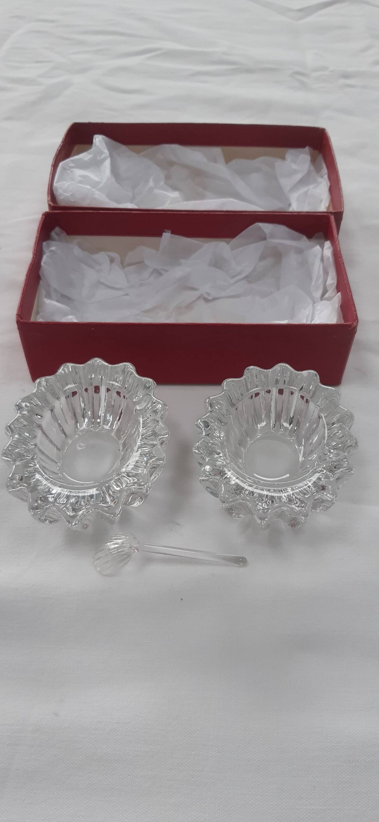 Antique crystal salt and pepper shakers, with their small spoon
