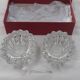Antique crystal salt and pepper shakers, with their small spoon