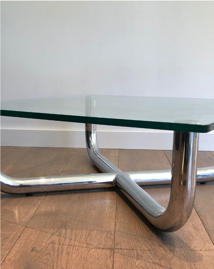 Chrome coffee table with a glass top