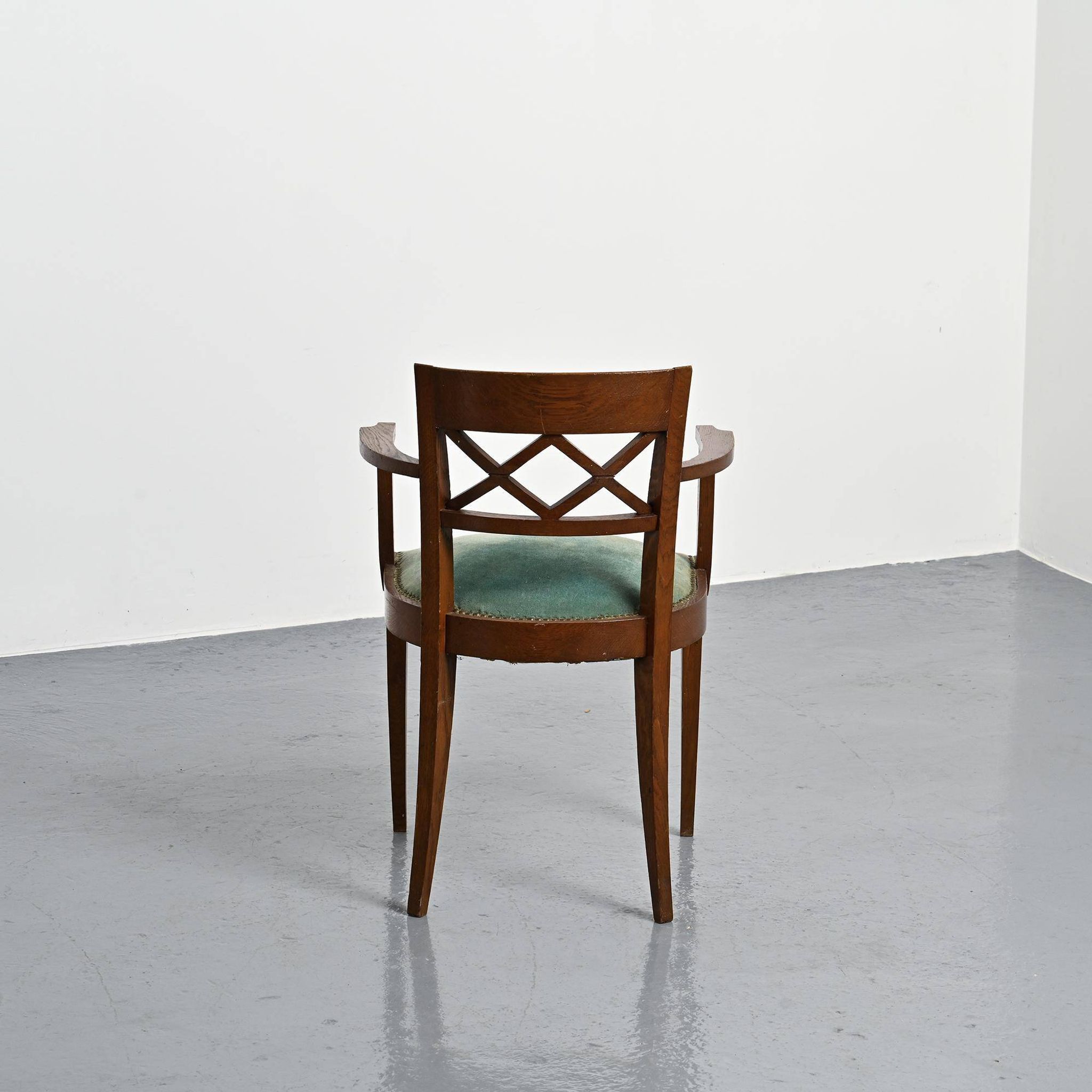 Set of four Art Deco armchairs in wood, France, circa 1940.