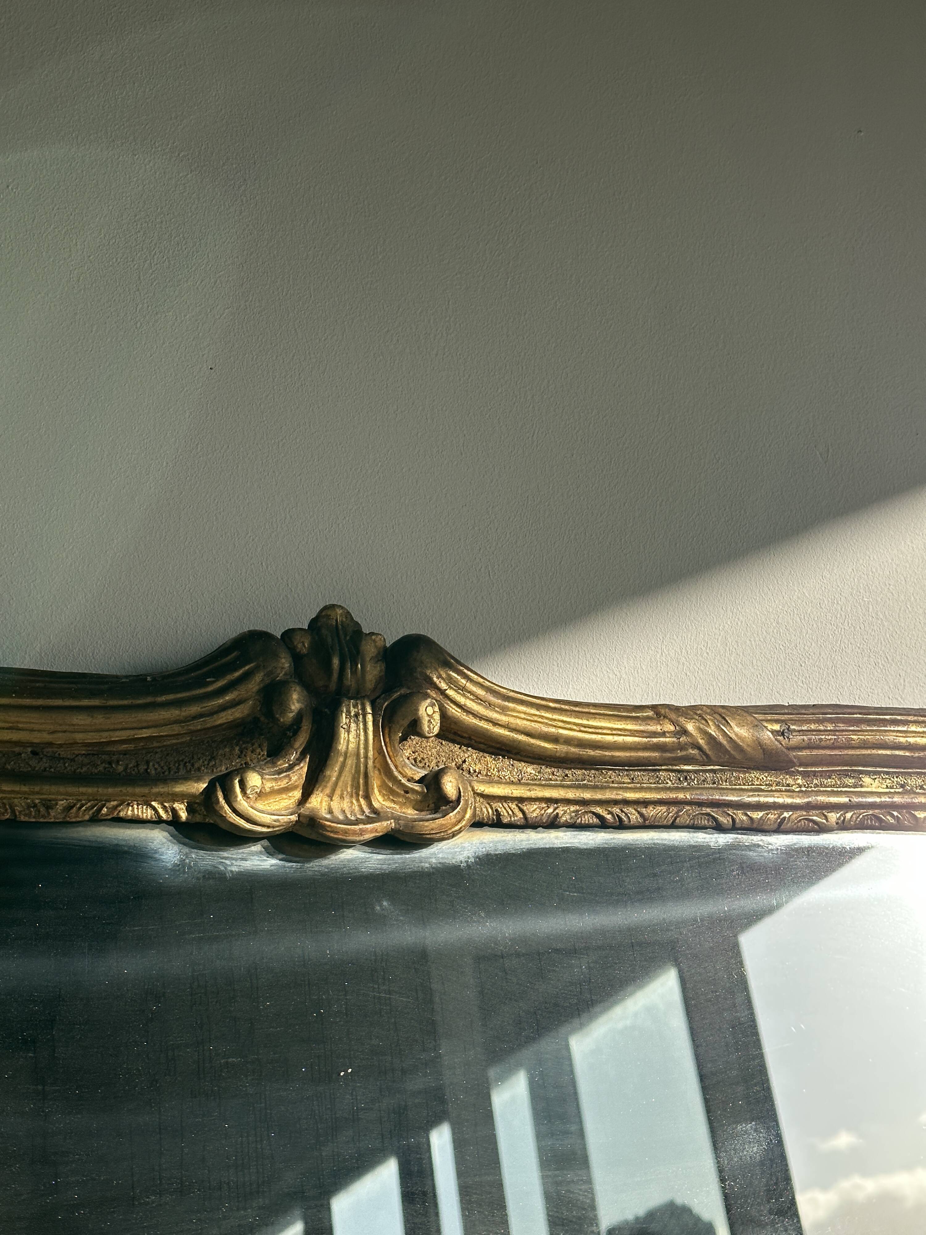 Large gilded mirror 19th century rounded corners mercury glass Louis XVI style