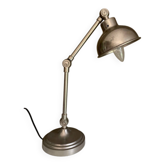 Articulated silver lamp