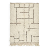 Moroccan rug with black graphic pattern