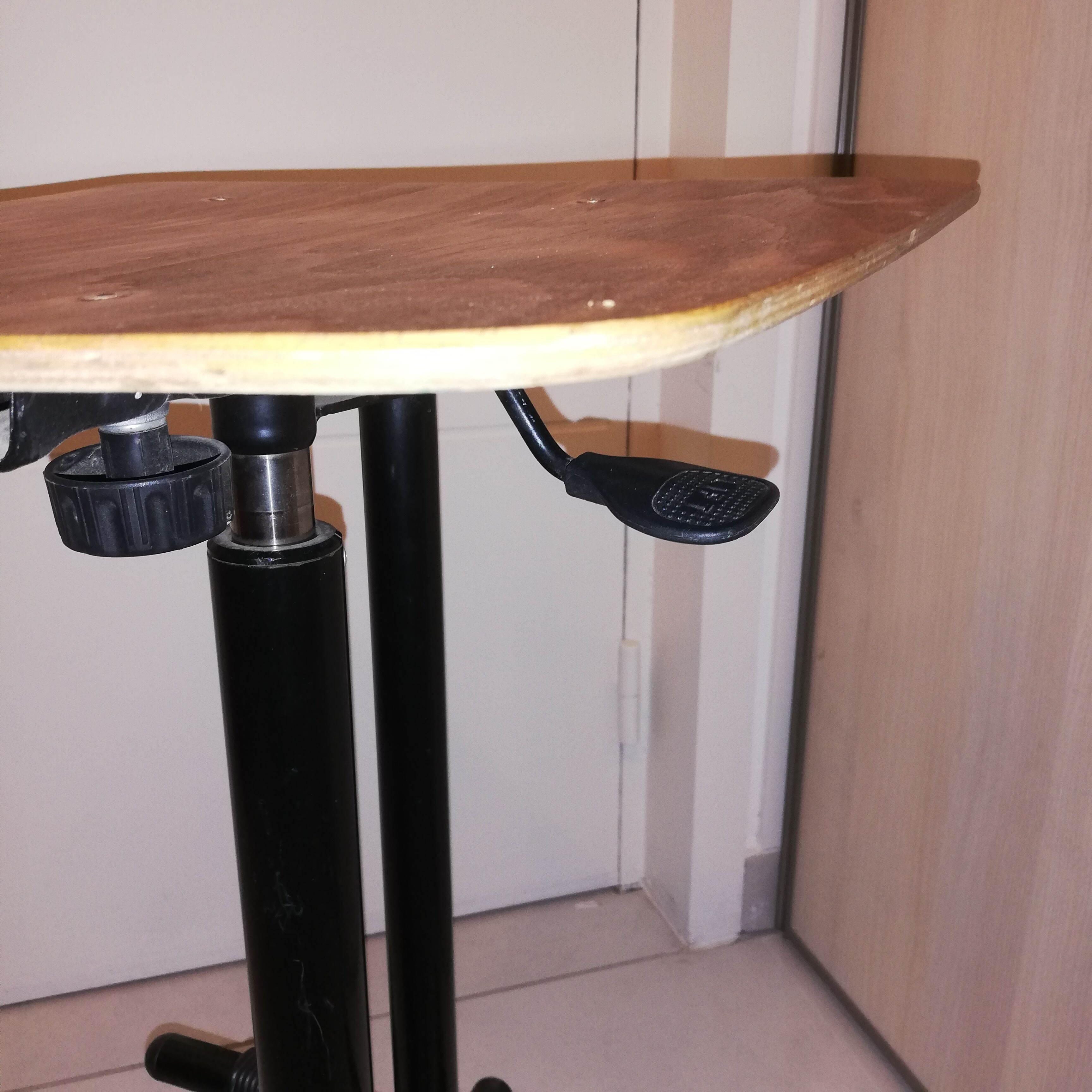 Industrial chair with height adjustment and foot rests