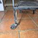 Perforated wrought iron rolling dessert trolley